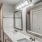 a bathroom with a large mirror