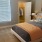 Bedroom with made bed