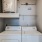 a white machine with a white shelf
