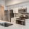 a kitchen with white cabinets